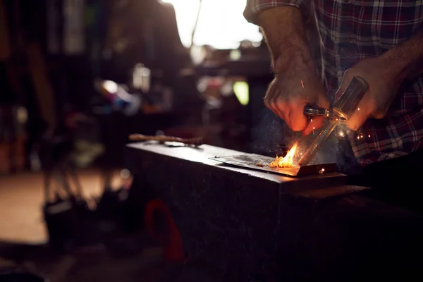 Close Male Blacksmith Lighting Wood Shavings Firesteel Anvil Light Forge — Stock Photo, Image