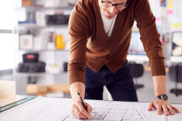 Male Architect Standing Desk Office Amending Building Plans — Fotografia de Stock