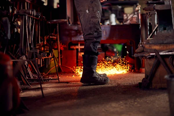 Close Male Blacksmith Standing Next Anvil Surrounded Sparks Embers — Stock Photo, Image