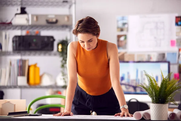 Portrait Female Architect Standing Desk Office Looking Plans Blueprints — Foto Stock