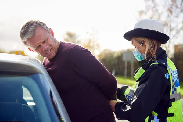 Male Driver Being Handcuffed Arrested Female Traffic Police Officer Driving — Stock Photo, Image