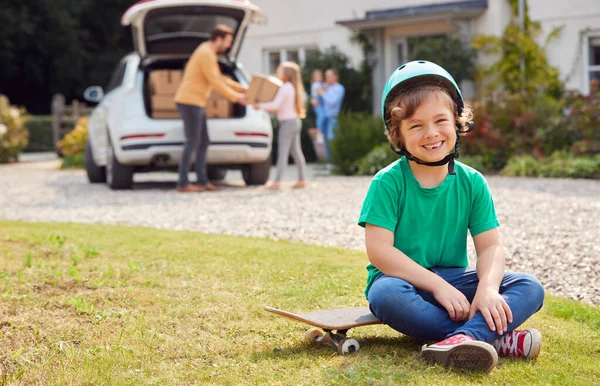 Portrait Boy Skateboard New Family Home Moving Day Unloading Boxes — Stock Photo, Image