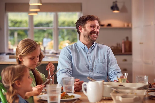 Father Children Sitting Table Home Enjoying Meal Together — Stock Photo, Image