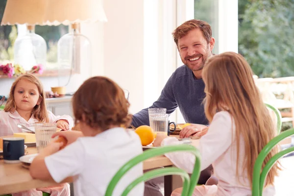 Father Children Wearing Pyjamas Sitting Table Enjoying Pancake Breakfast Together — Stock Photo, Image