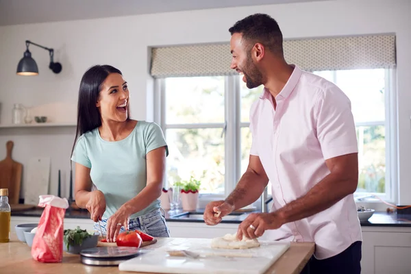 Couple Kitchen Home Preparing Homemade Pizzas Together Stock Picture