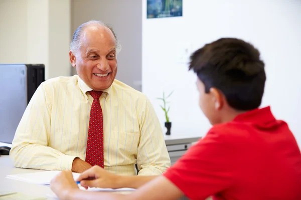 Male Student Talking To School Counselor — Stock Photo, Image