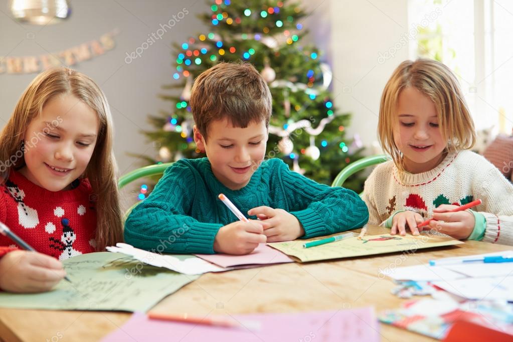 Children Writing Letters To Santa Stock Photo by ©monkeybusiness 59343939
