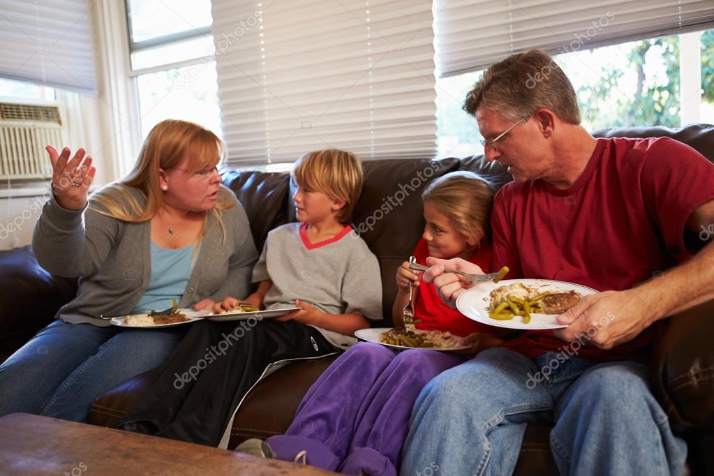 Family Eating Meal And Arguing — Stock Photo © monkeybusiness 59343981