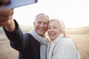 Senior Couple  Taking Selfie clipart