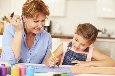 Grandmother Painting With Granddaughter clipart