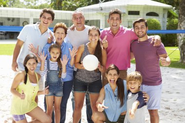 Multi Generation Family Playing Volleyball clipart