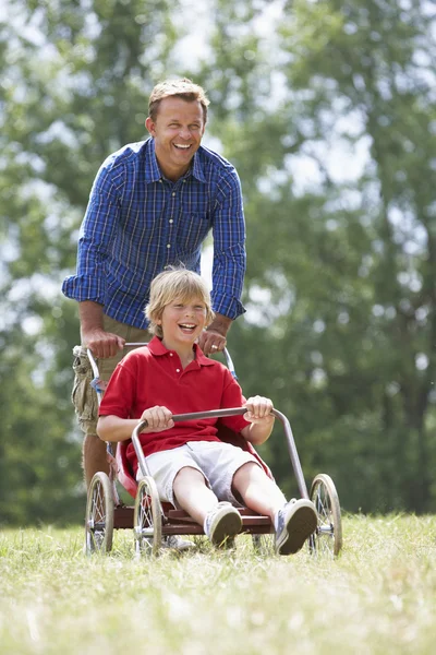 Father and son with go-kart — Stock Photo, Image
