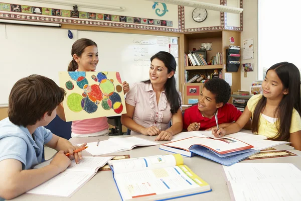 Schoolchildren in class — Stock Photo, Image