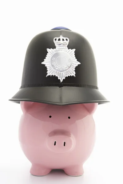 Spaarpot met policeman's helm — Stockfoto