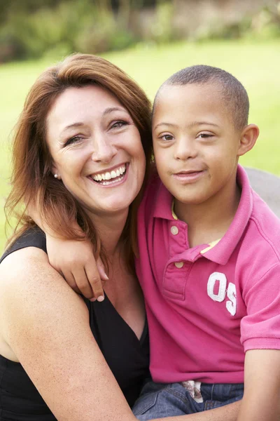 Mother with Downs Syndrome son — Stock Photo, Image