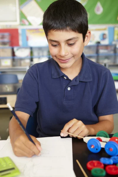 Boy in physics class Royalty Free Stock Images