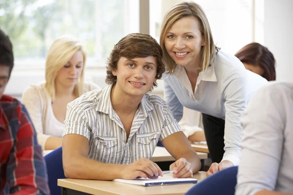 Students and female tutor Stock Image