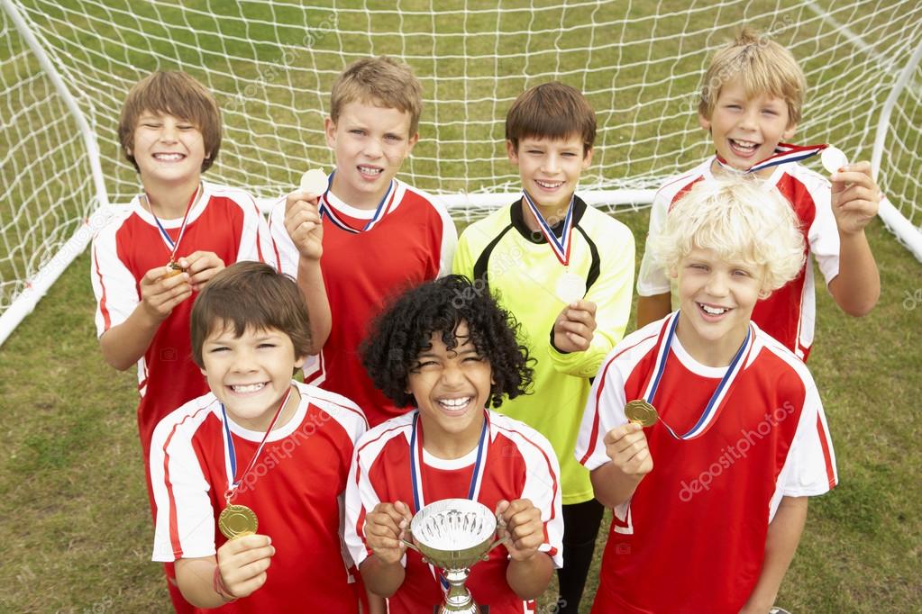 Winning junior soccer team — Stock Photo © monkeybusiness 61028063