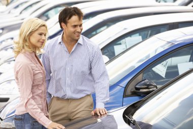 Couple buying a car clipart