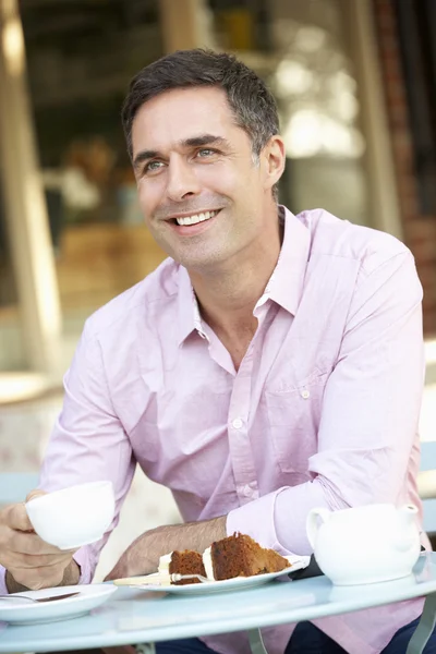 Man sitting in cafe — Stock Photo, Image