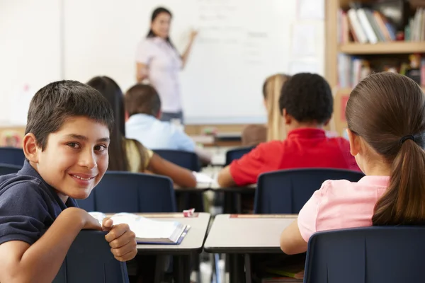 Schoolchildren in class — Stock Photo, Image