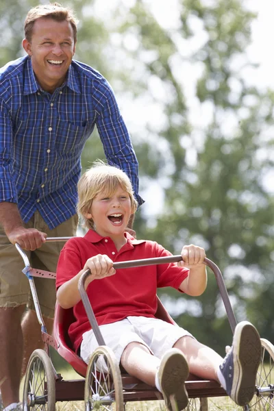 Father and son with go-kart — Stock Photo, Image