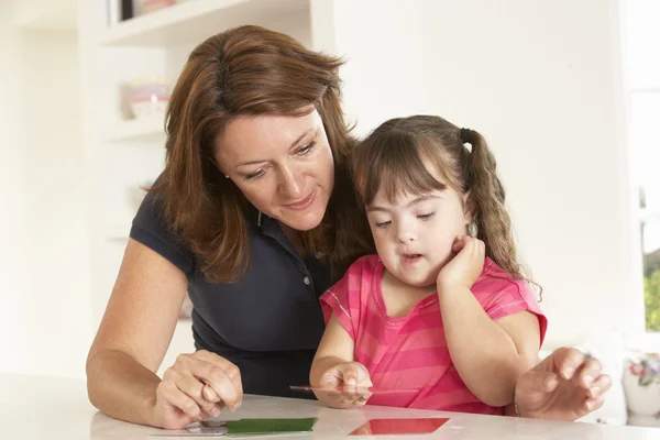 Downs syndroom meisje therapie — Stockfoto