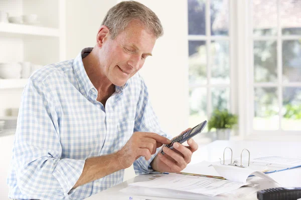 Man with household bills — Stock Photo, Image