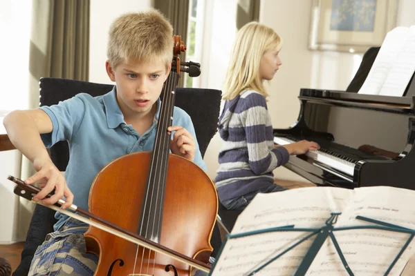 Děti violoncello a klavír — Stock fotografie