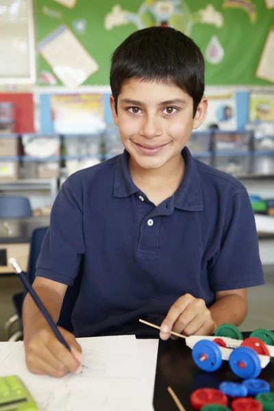 Boy in physics class Royalty Free Stock Images