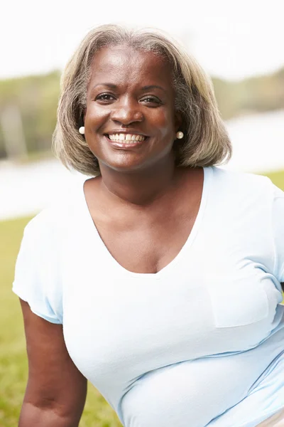 Senior Woman Sitting In Garden — Stock Photo, Image