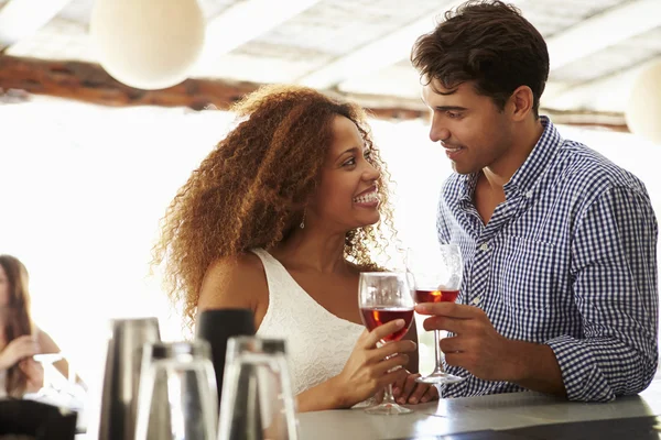 Couple Enjoying Drink At Bar — Stock Image Couple Enjoying Drink At Bar Royalty Free Stock Images