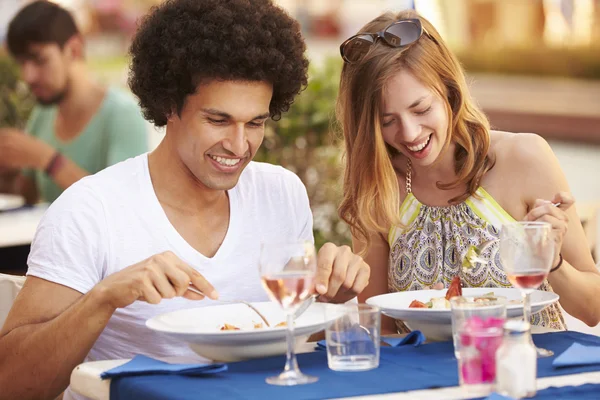 Young Couple Enjoying Meal Stock Picture