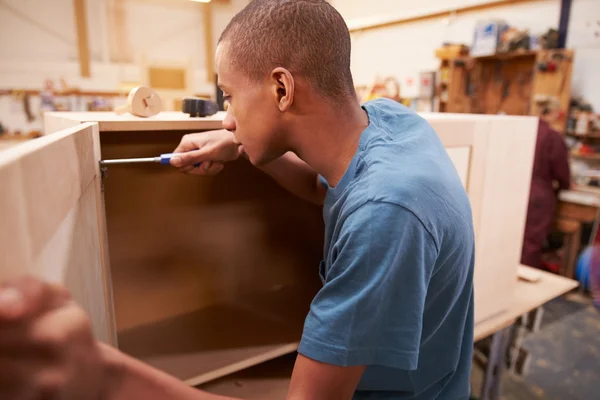 Apprentice Building Furniture In Workshop — Stock Photo, Image