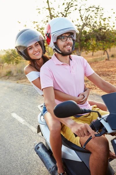 Couple Riding Motor Scooter — Stock Photo, Image