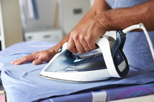 Man Ironing Laundry — Stock Photo, Image