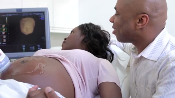 Pregnant Woman Having 4D Ultrasound Scan With Partner — Stock Video