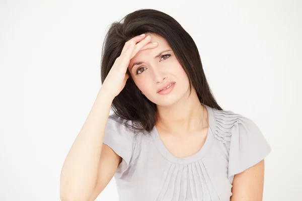 Stressed Woman Against White Background Royalty Free Stock Images