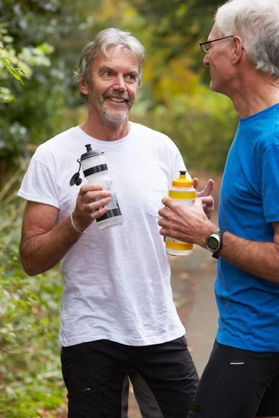 Mature Male Joggers Taking Break — Stock Photo, Image