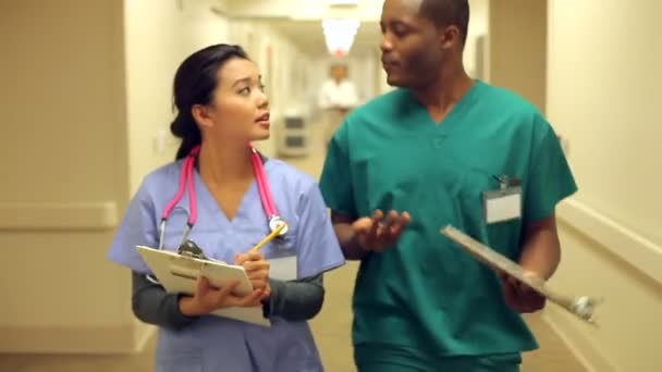 Medical Staff Walking Along Corridor — Stock Video