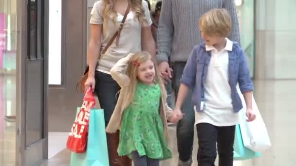 Children With Parents In Shopping Mall — Stock Video