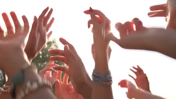 Group of friends dancing with hands in air — Stock Video