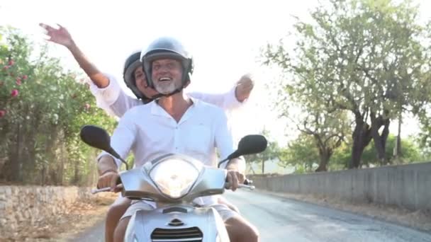 Mature Couple Riding Motor Scooter — Stock Video