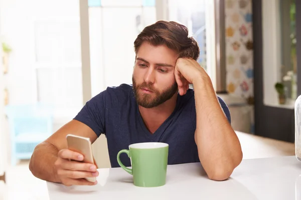 Man Using Mobile Phone At Home — Stock Photo, Image