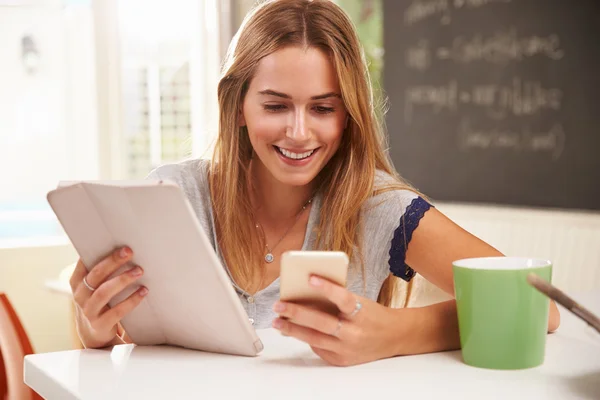 Woman Using Digital Tablet And Mobile Phone — Stock Photo, Image