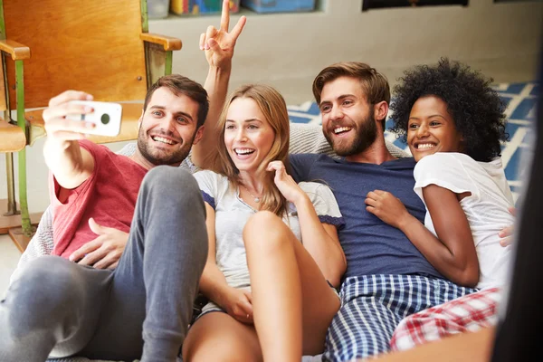 Friends in Pajamas Taking Selfie On Mobile — Stock Photo, Image