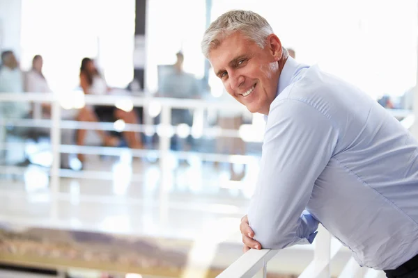 Middle aged man in office — Stock Photo, Image