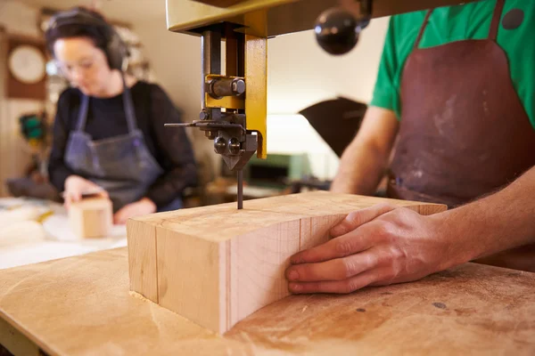 Shoemakers cutting and shaping wood — Stock Photo, Image
