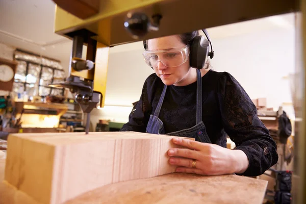 Shoemaker cutting and shaping wood — Stock Photo, Image