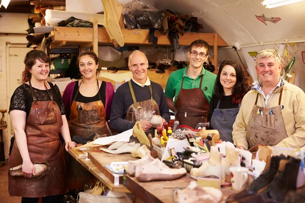 Group of Shoemakers in workshop — Stock Photo, Image